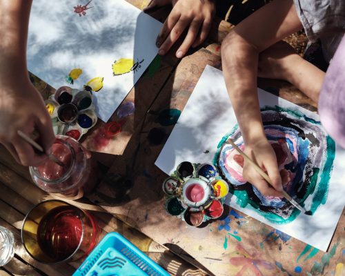 Kids painting art outdoor activity, montessori homeschooling education